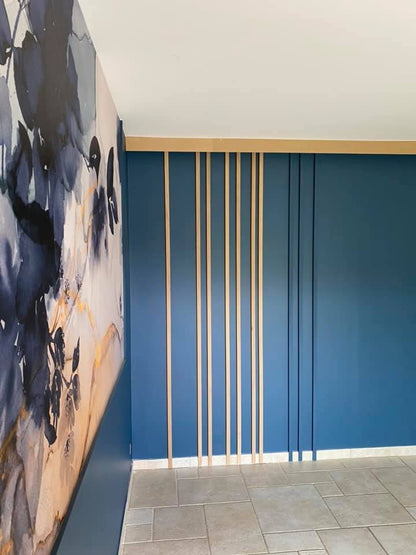 Porte coulissante en tasseaux de bois