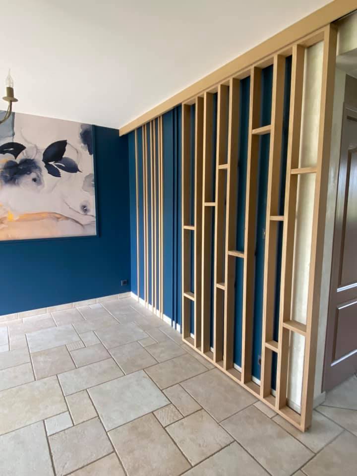 Porte coulissante en tasseaux de bois